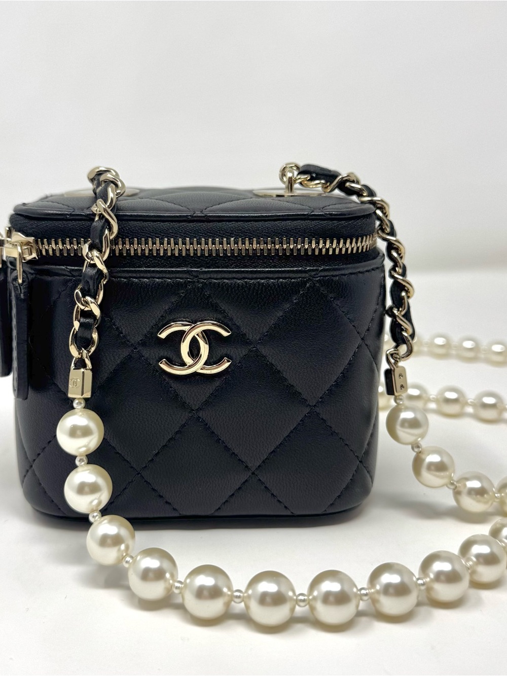 CHANEL Black Quilted Vanity Bag with Pearl-Accent Chain